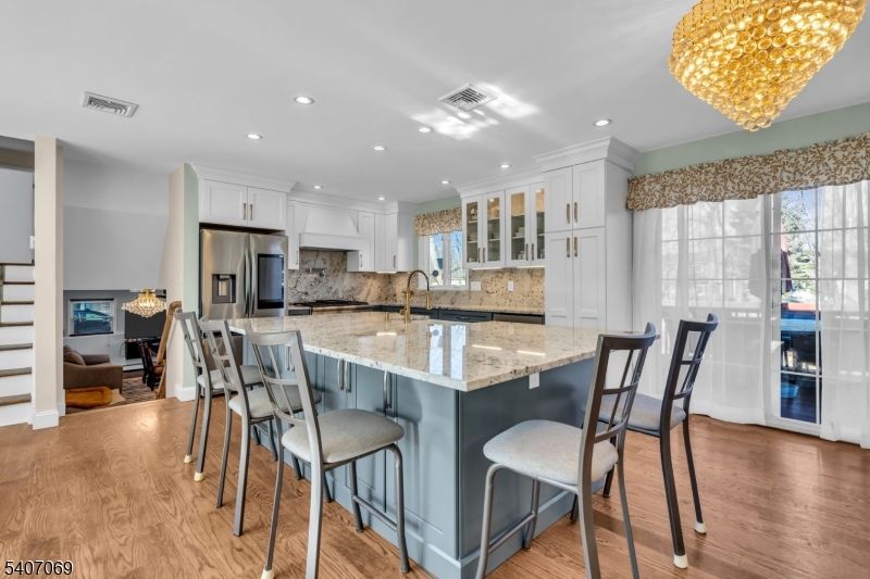 Chandelier, Interior, Kitchen, Recessed Lighting, Stainless Steel Appliances, Wood Texture Flooring