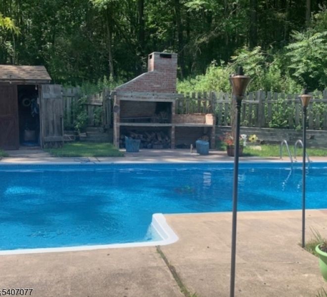 Exterior, Fireplace, Pool