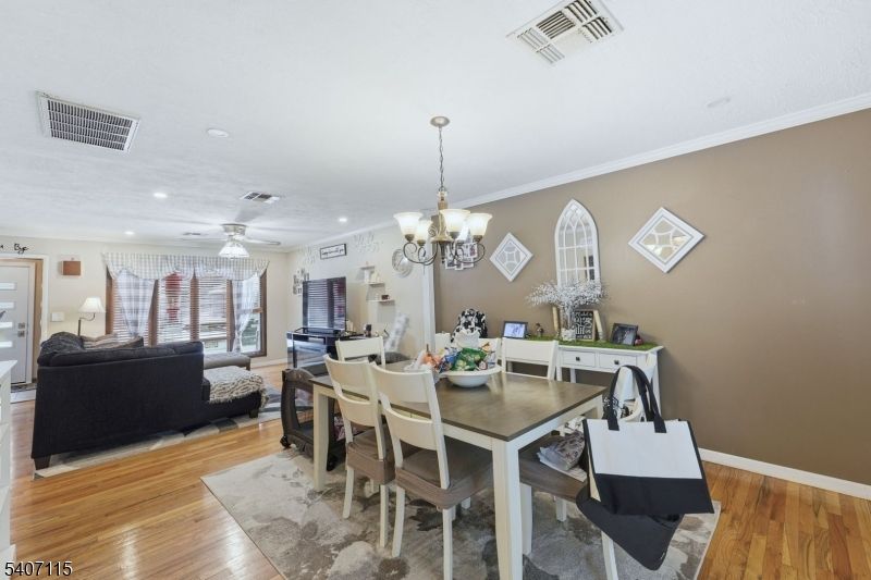 Chandelier, Dining room, Interior, Living room, Recessed Lighting, Wood Texture Flooring
