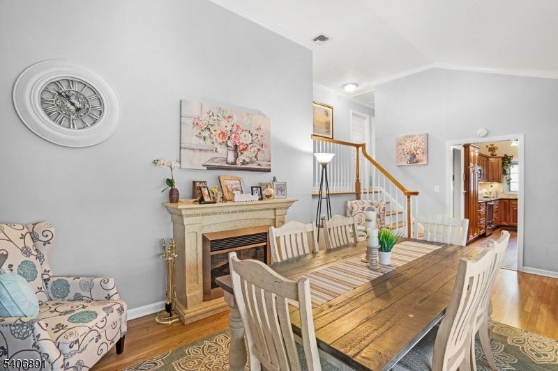 Dining room, Fireplace, Interior, Recessed Lighting, Wood Texture Flooring