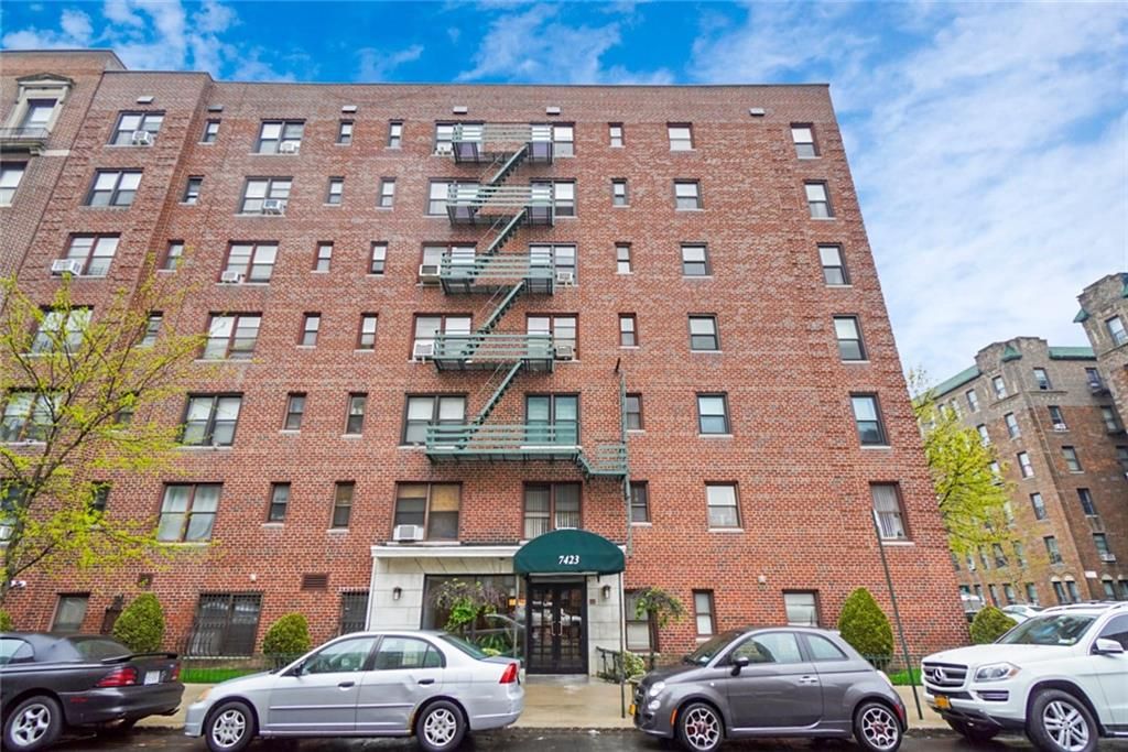 Exterior, Facade, Brick Facade, Condo Building