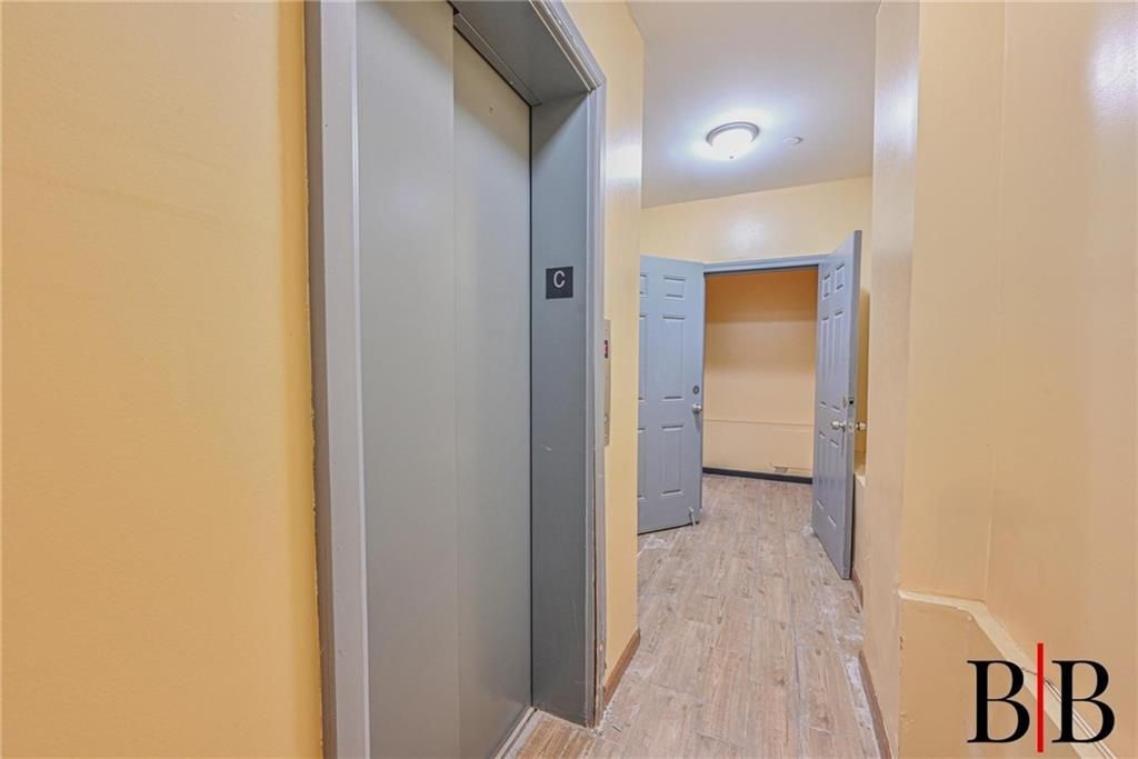 Elevator, Interior, Wood Texture Flooring