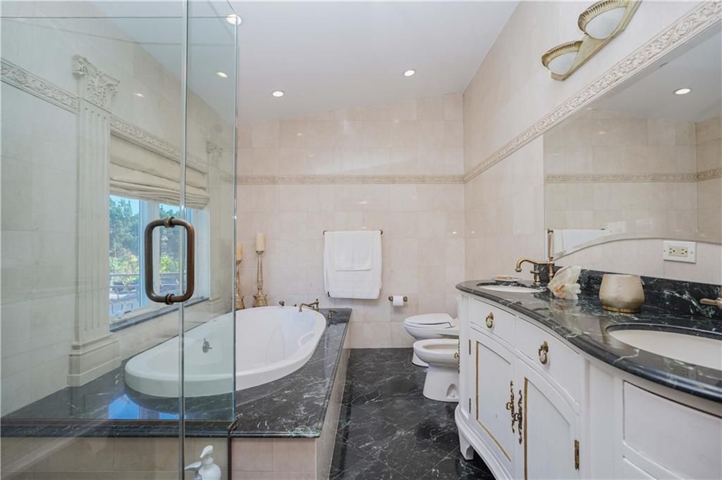 Bathroom, Dual Sink Vanities, Glass Shower, Interior, Marble, Recessed Lighting