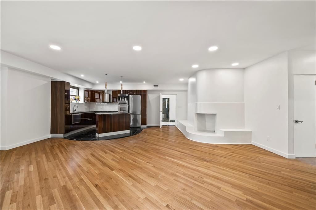 Fireplace, Interior, Kitchen, Pendant Lights, Recessed Lighting, Stainless Steel Appliances, Wood Texture Flooring