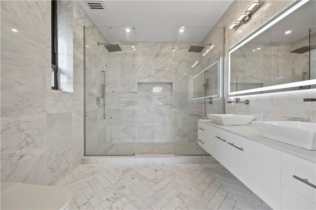 Bathroom, Dual Sink Vanities, Glass Shower, Interior, Marble Walls, Recessed Lighting