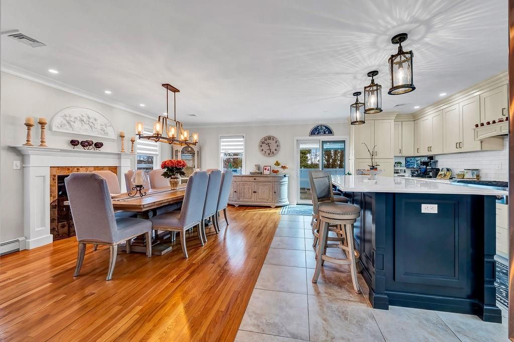 Chandelier, Dining room, Fireplace, Interior, Kitchen, Pendant Lights, Recessed Lighting, Wood Texture Flooring
