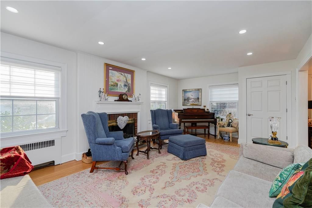 Fireplace, Interior, Living room, Piano, Recessed Lighting, Wood Texture Flooring