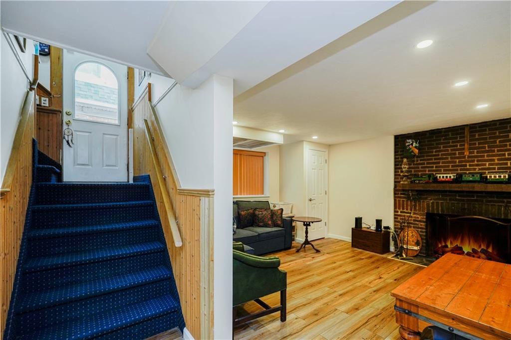 Fireplace, Interior, Recessed Lighting, Stone Walls, Wood Texture Flooring