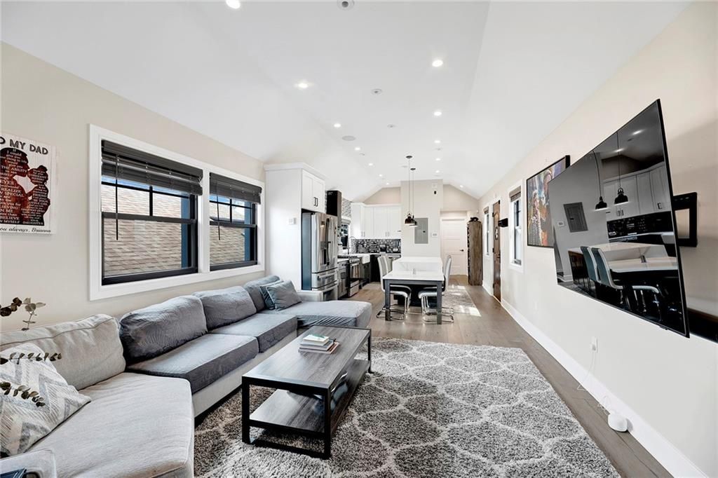 Dining room, Interior, Kitchen, Living room, Pendant Lights, Recessed Lighting, Stainless Steel Appliances, Wood Texture Flooring