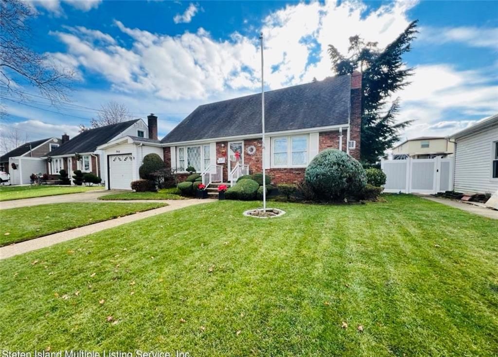 Attached, Backyard, Exterior, Facade, Brick Facade, Cape Cod