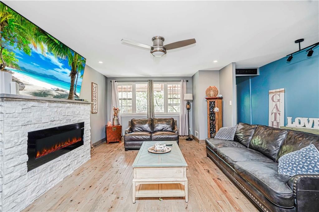 Fireplace, Interior, Living room, Recessed Lighting, Wood Texture Flooring