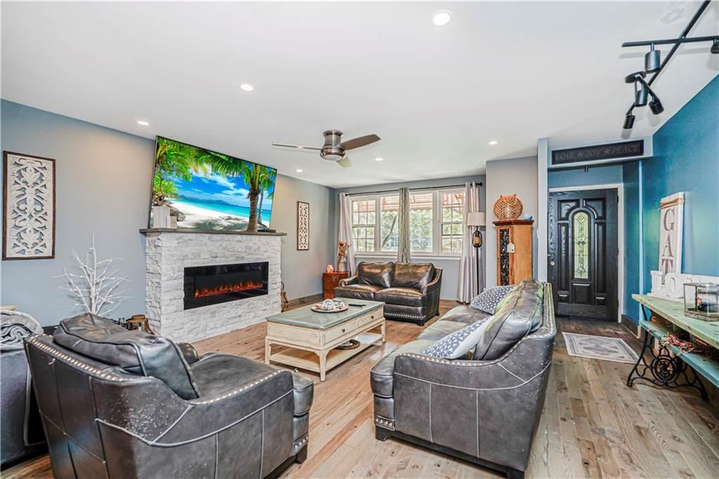 Fireplace, Interior, Living room, Recessed Lighting, Wood Texture Flooring