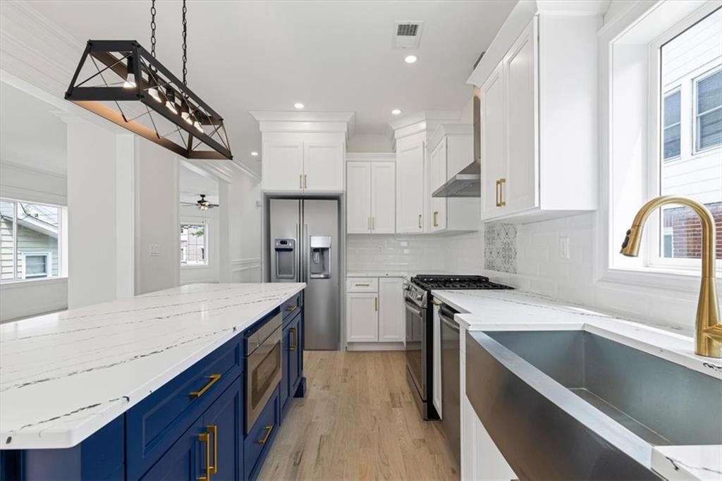 Interior, Kitchen, Pendant Lights, Recessed Lighting, Stainless Steel Appliances, Wood Texture Flooring