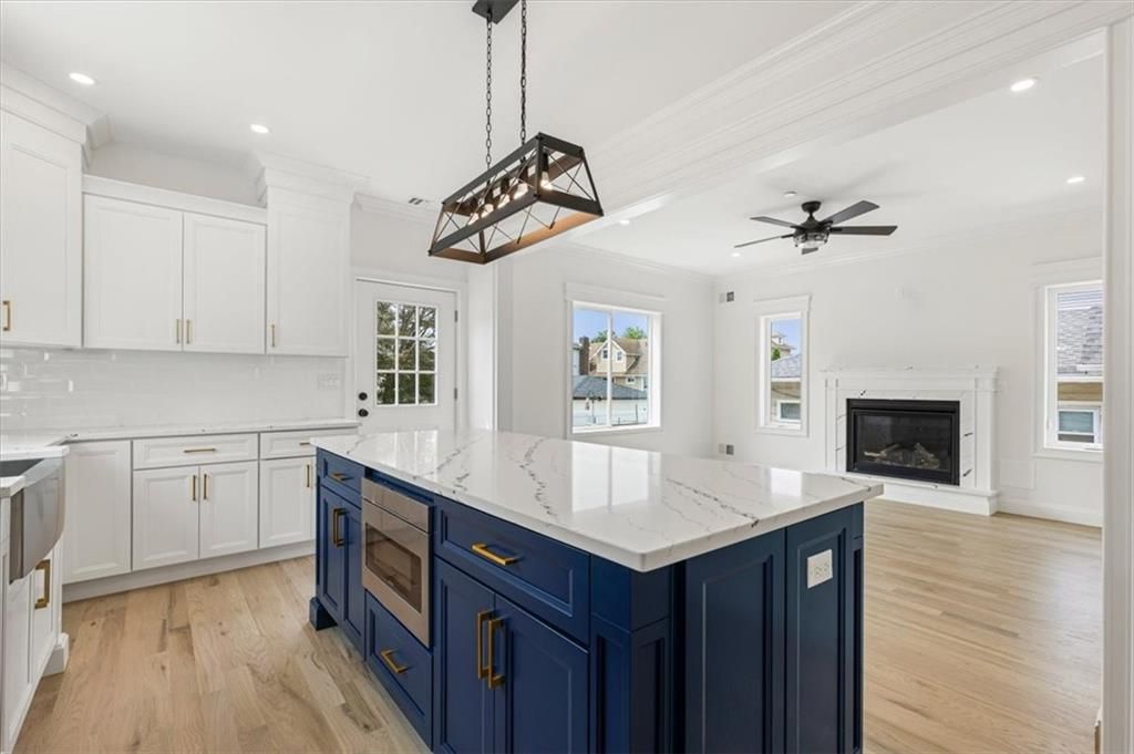 Fireplace, Interior, Kitchen, Pendant Lights, Recessed Lighting, Wood Texture Flooring