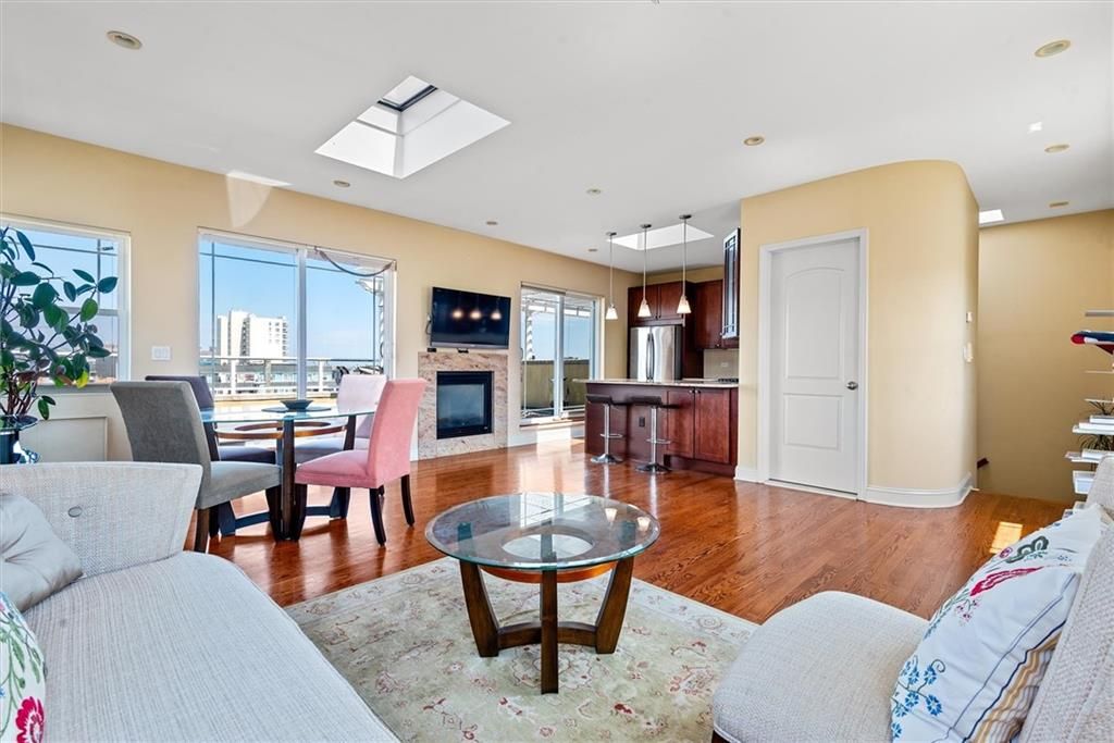 Dining room, Fireplace, Interior, Kitchen, Living room, Pendant Lights, Recessed Lighting, Wood Texture Flooring