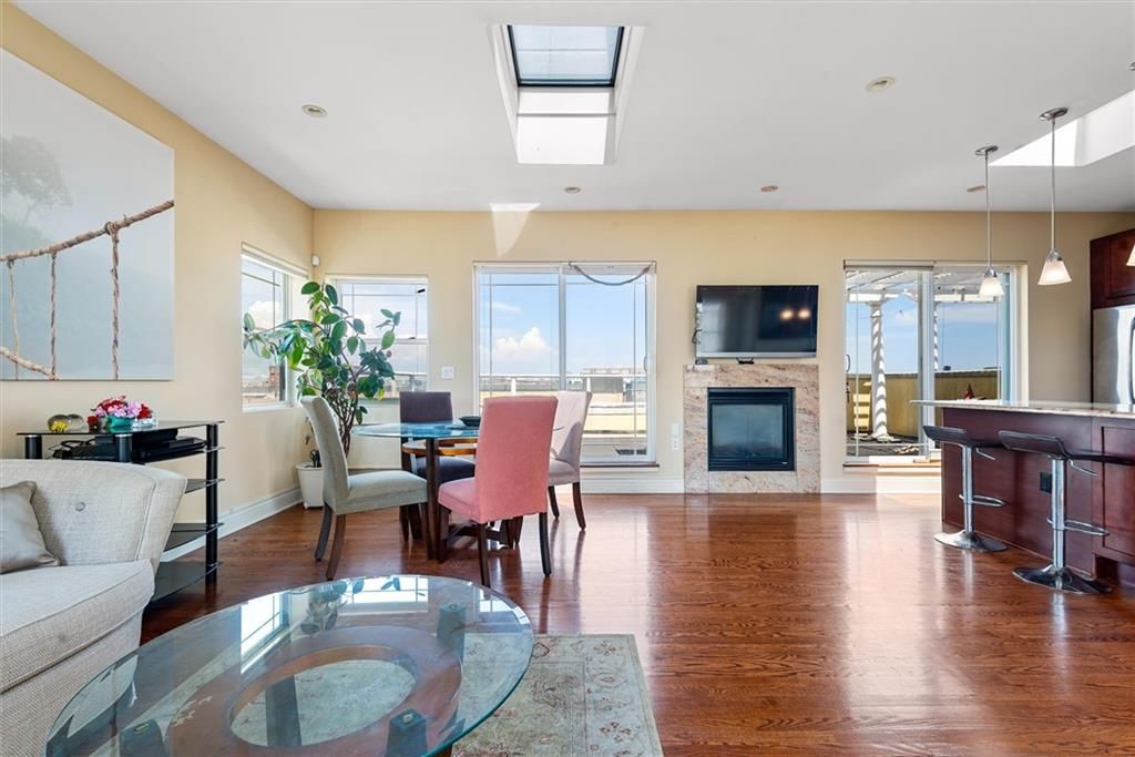 Dining room, Fireplace, Interior, Pendant Lights, Recessed Lighting, Wood Texture Flooring