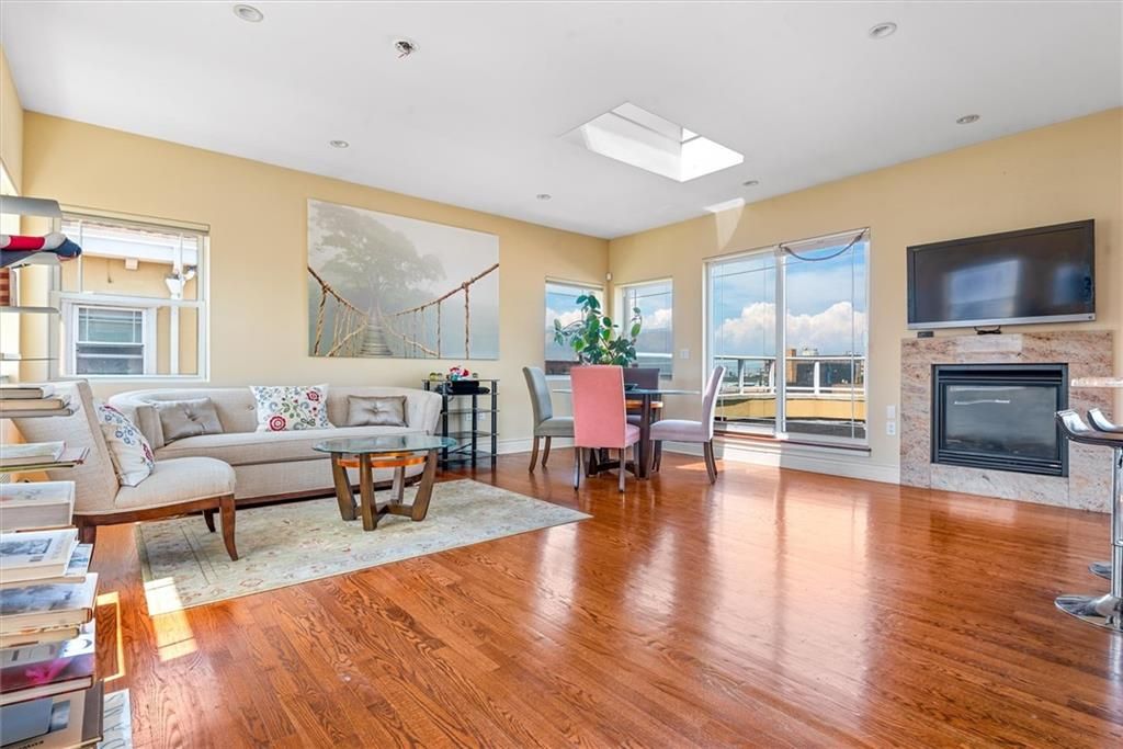 Dining room, Fireplace, Interior, Living room, Recessed Lighting, Wood Texture Flooring