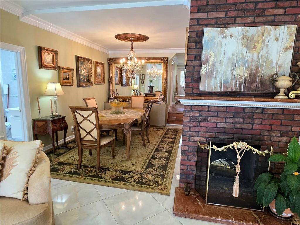 Chandelier, Dining room, Fireplace, Interior, Stone Walls