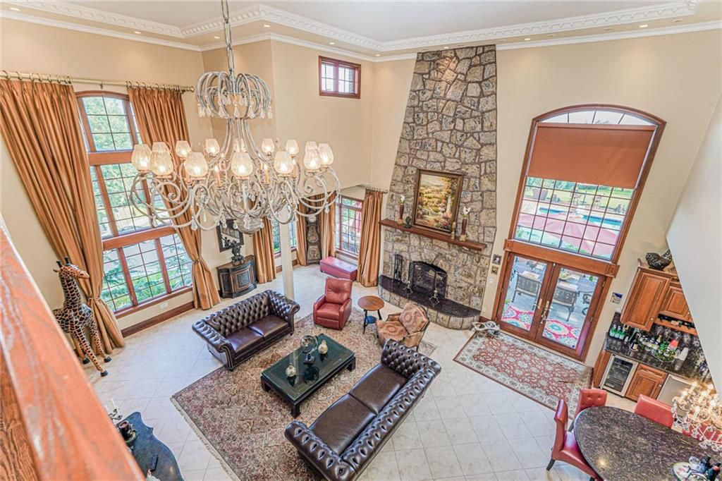 Chandelier, Fireplace, Interior, Living room, Recessed Lighting, Stone Walls