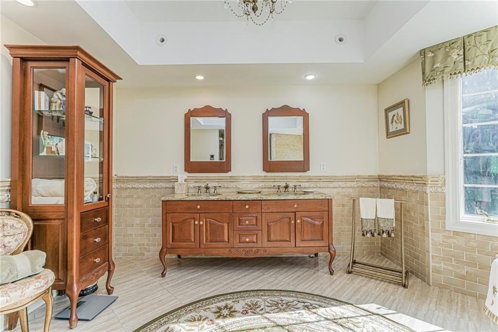 Bathroom, Dual Sink Vanities, Interior, Recessed Lighting, Stone Walls