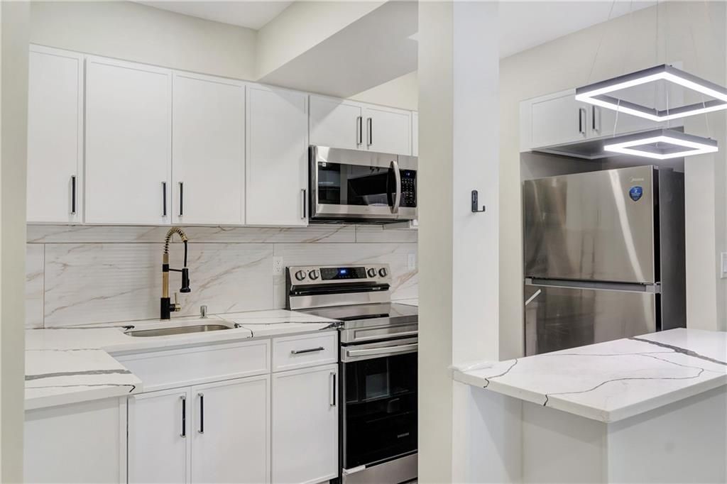 Interior, Kitchen, Marble Walls, Stainless Steel Appliances