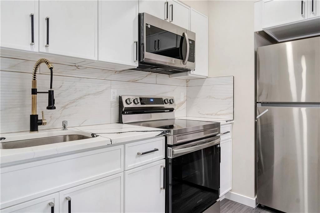 Interior, Kitchen, Marble Walls, Stainless Steel Appliances, Wood Texture Flooring