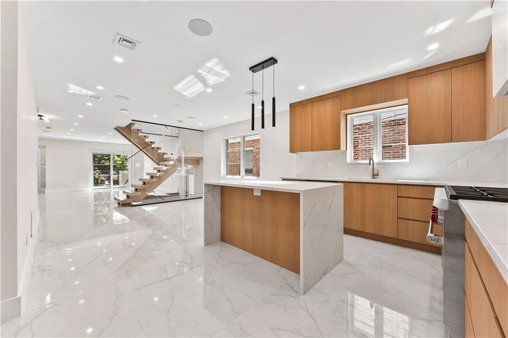 Interior, Kitchen, Marble, Marble Walls, Pendant Lights, Recessed Lighting, Stainless Steel Appliances