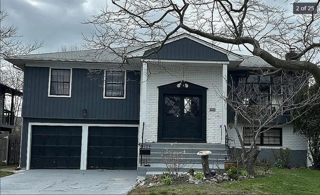 Attached, Exterior, Facade, Raised Ranch