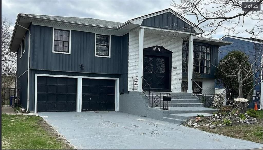 Attached, Exterior, Facade, Raised Ranch