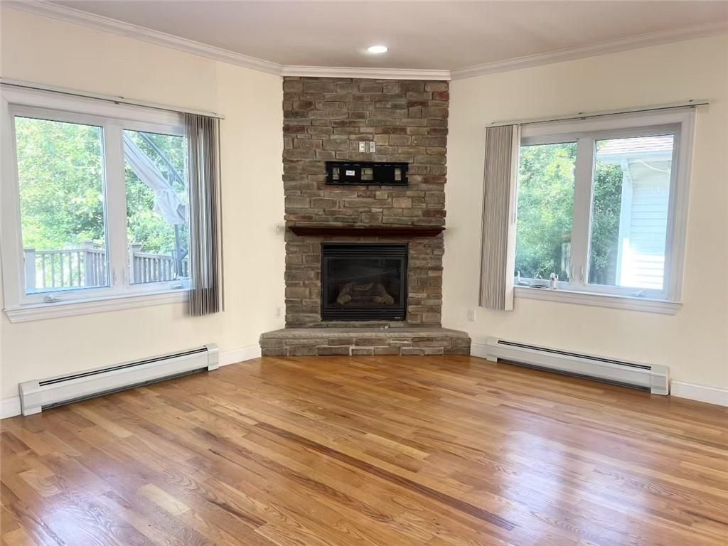 Empty room, Fireplace, Interior, Recessed Lighting, Stone Walls, Wood Texture Flooring