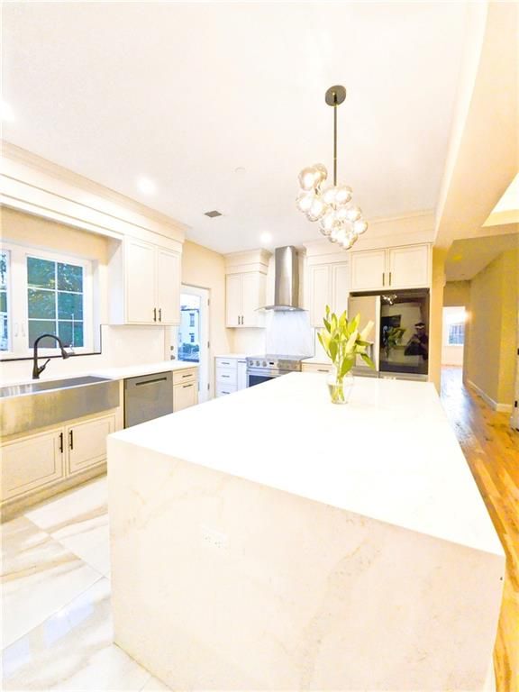 Chandelier, Interior, Kitchen, Pendant Lights, Recessed Lighting, Stainless Steel Appliances, Wood Texture Flooring