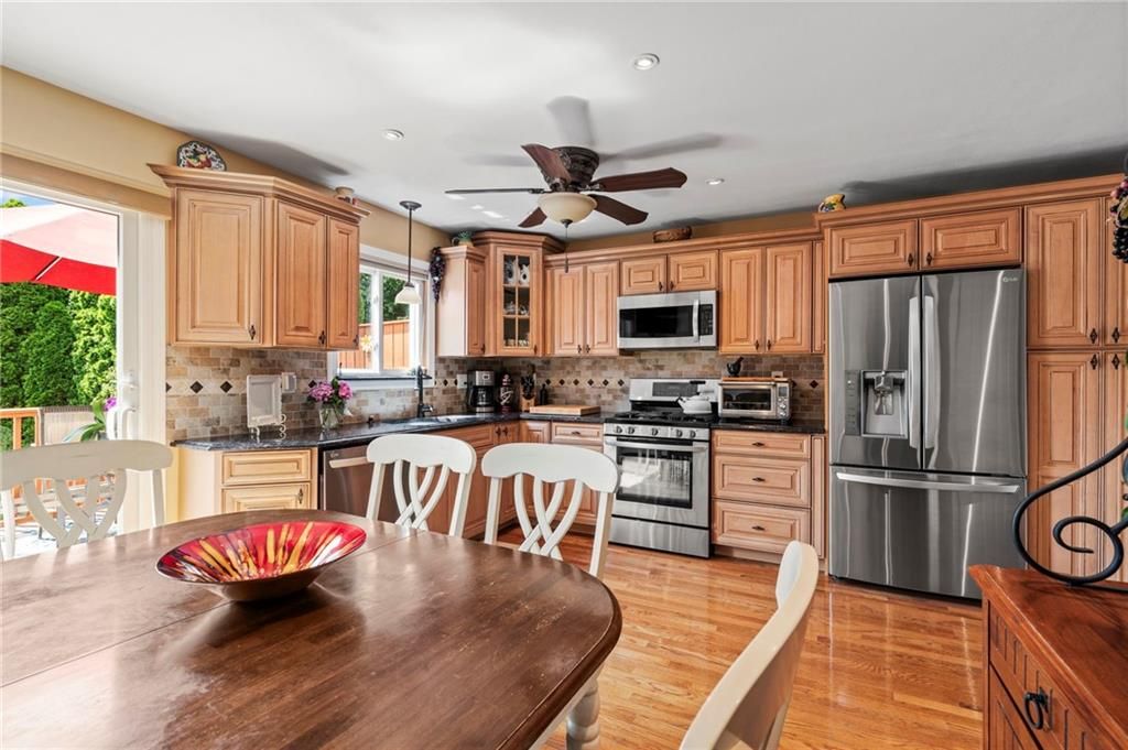 Dining room, Interior, Kitchen, Recessed Lighting, Stainless Steel Appliances, Wood Texture Flooring