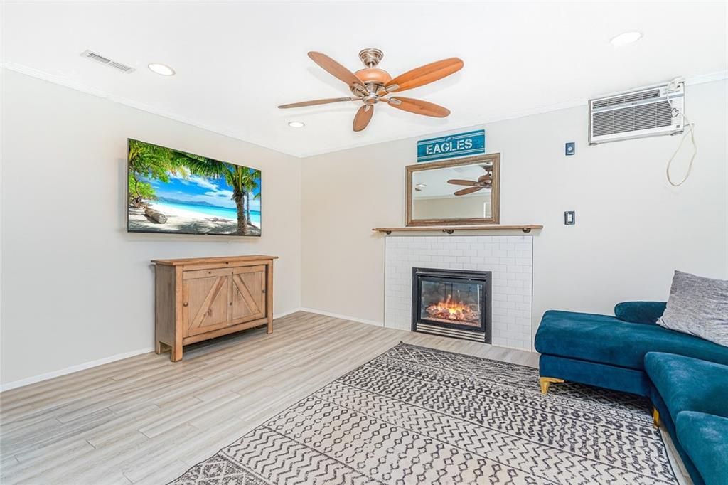 Fireplace, Interior, Recessed Lighting, Wood Texture Flooring