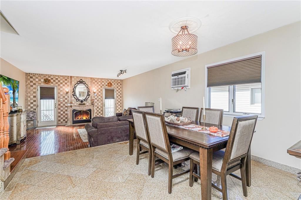 Dining room, Fireplace, Interior, Living room, Pendant Lights, Wood Texture Flooring