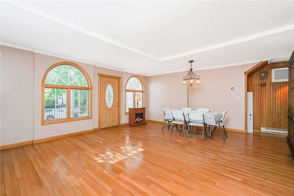 Dining room, Fireplace, Interior, Pendant Lights, Wood Texture Flooring