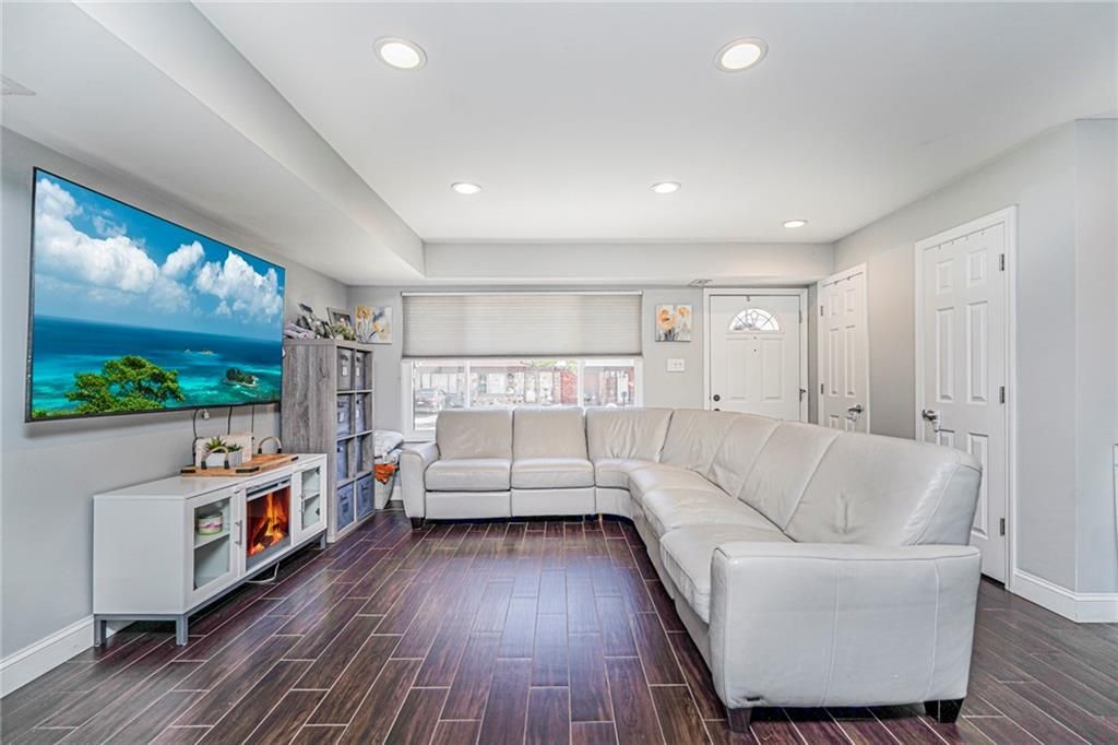 Fireplace, Interior, Living room, Recessed Lighting, Water, Wood Texture Flooring