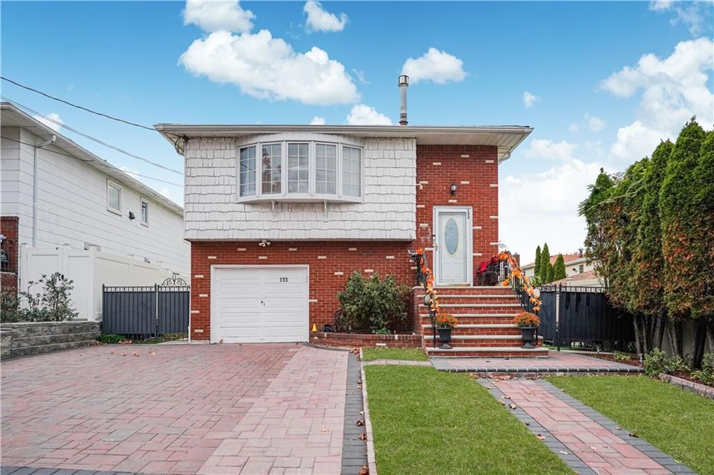 Attached, Exterior, Facade, Brick Facade, Raised Ranch