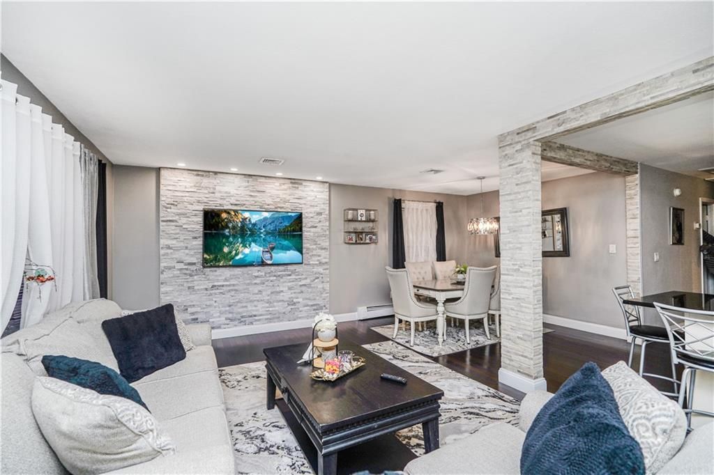 Dining room, Interior, Living room, Pendant Lights, Recessed Lighting, Stone Walls, Wood Texture Flooring