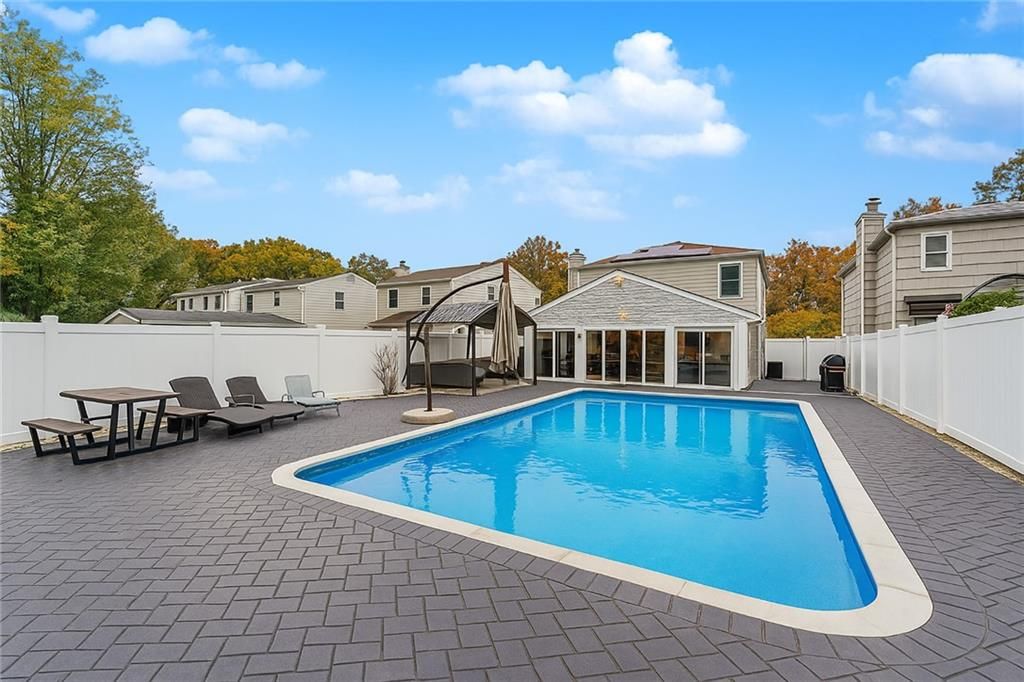 Exterior, Pool, Solar Panels