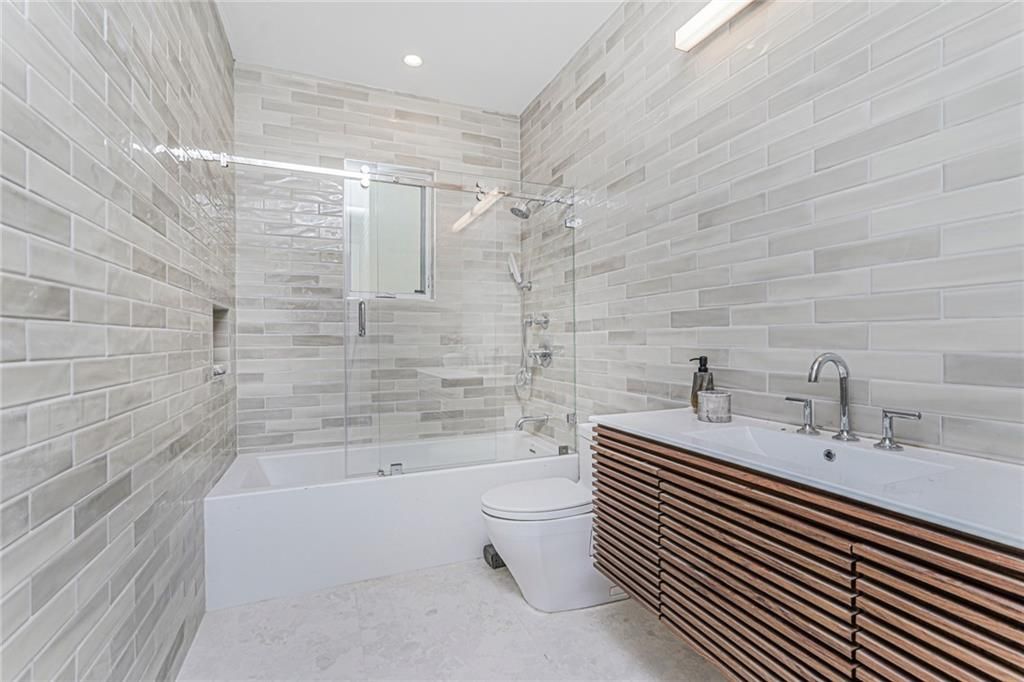 Bathroom, Glass Shower, Interior, Recessed Lighting, Stone Walls