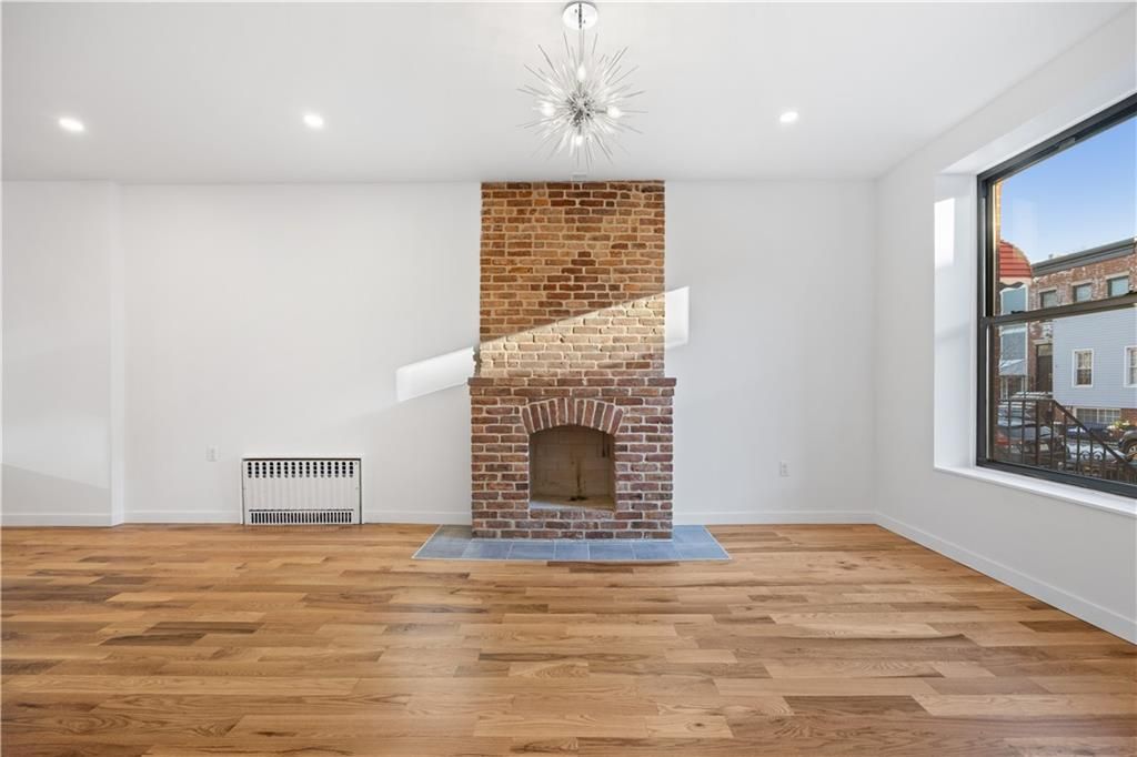 Empty room, Fireplace, Interior, Recessed Lighting, Wood Texture Flooring
