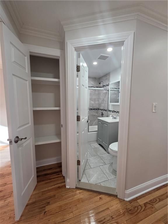 Bathroom, Interior, Marble Walls, Recessed Lighting, Wood Texture Flooring