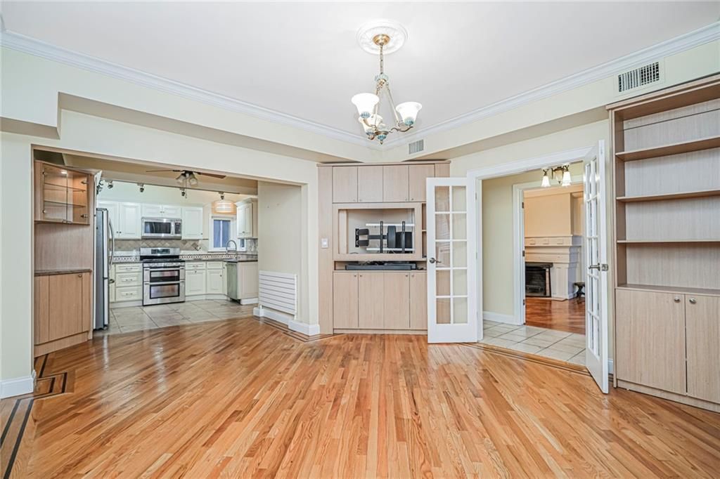 Chandelier, Empty room, Interior, Kitchen, Pendant Lights, Stainless Steel Appliances, Wood Texture Flooring