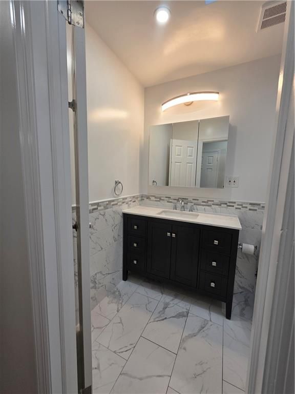 Bathroom, Dual Sink Vanities, Interior, Marble, Recessed Lighting