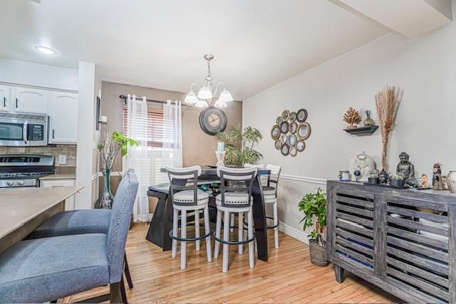 Chandelier, Dining room, Interior, Kitchen, Recessed Lighting, Stainless Steel Appliances, Wood Texture Flooring