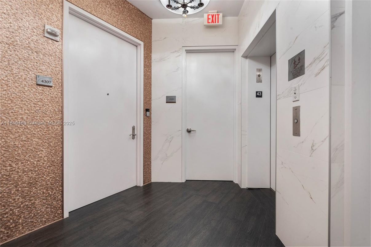 Elevator, Interior, Marble Walls, Wood Texture Flooring