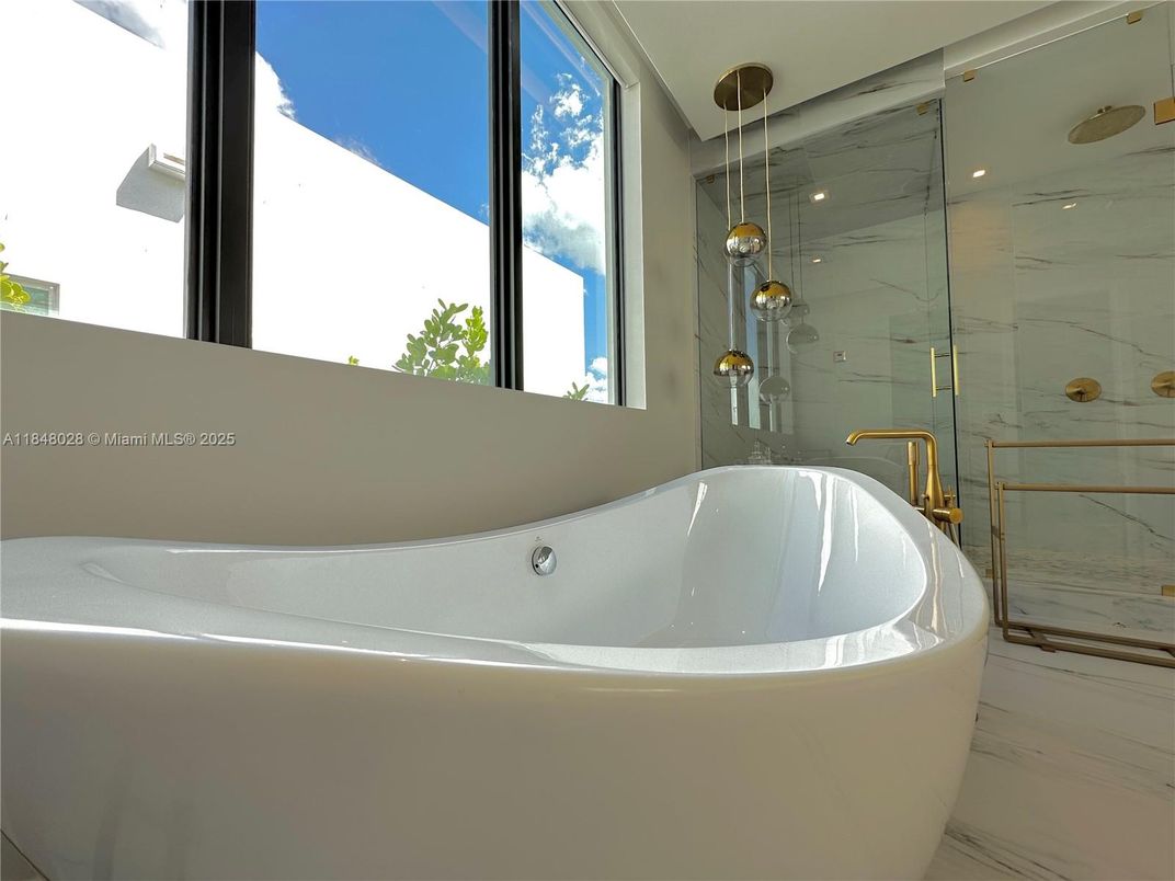 Bathroom, Free Standing Baths, Glass Shower, Interior, Marble, Marble Walls, Recessed Lighting