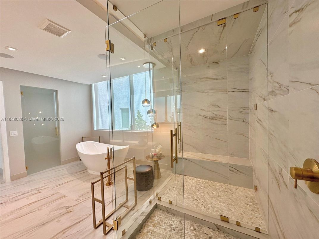 Bathroom, Free Standing Baths, Glass Shower, Interior, Marble, Marble Walls, Recessed Lighting