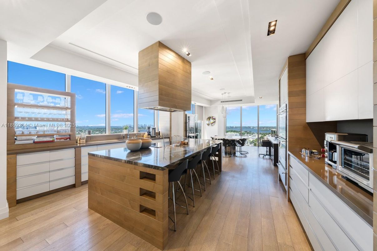 Dining room, Interior, Kitchen, Pendant Lights, Recessed Lighting, Stainless Steel Appliances, Water, Wood Texture Flooring