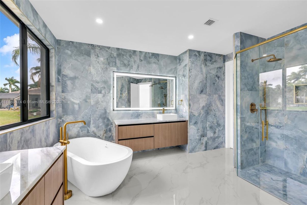 Bathroom, Free Standing Baths, Glass Shower, Interior, Marble, Marble Walls, Recessed Lighting